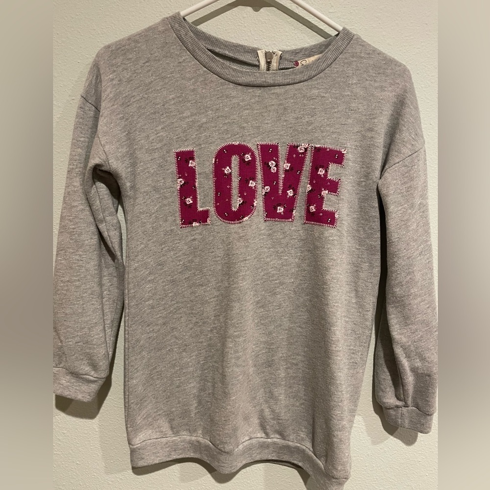 Speechless gray sweatshirt LOVE stitched letters on front.  Zipper back.…